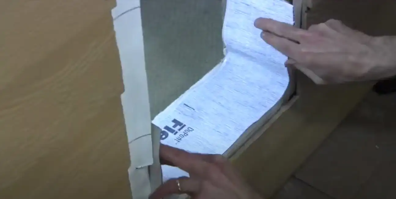 Vidcap showing the application of flexible flashing to rough opening
